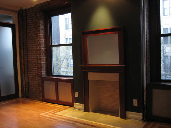 Living room with exposed brick