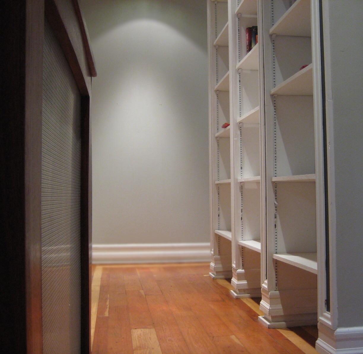 Built-in bookshelves along the hall